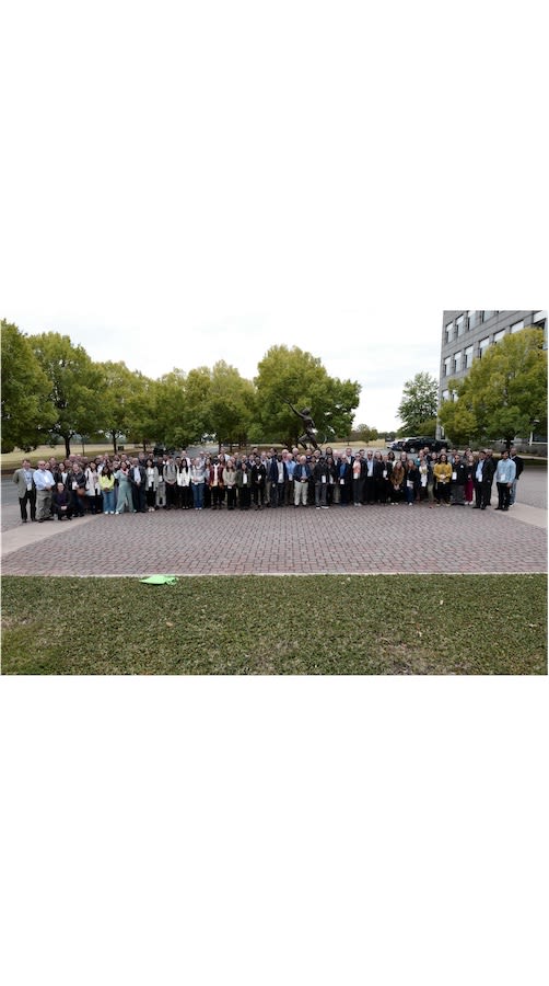 A group of people gathered after a scientific conference