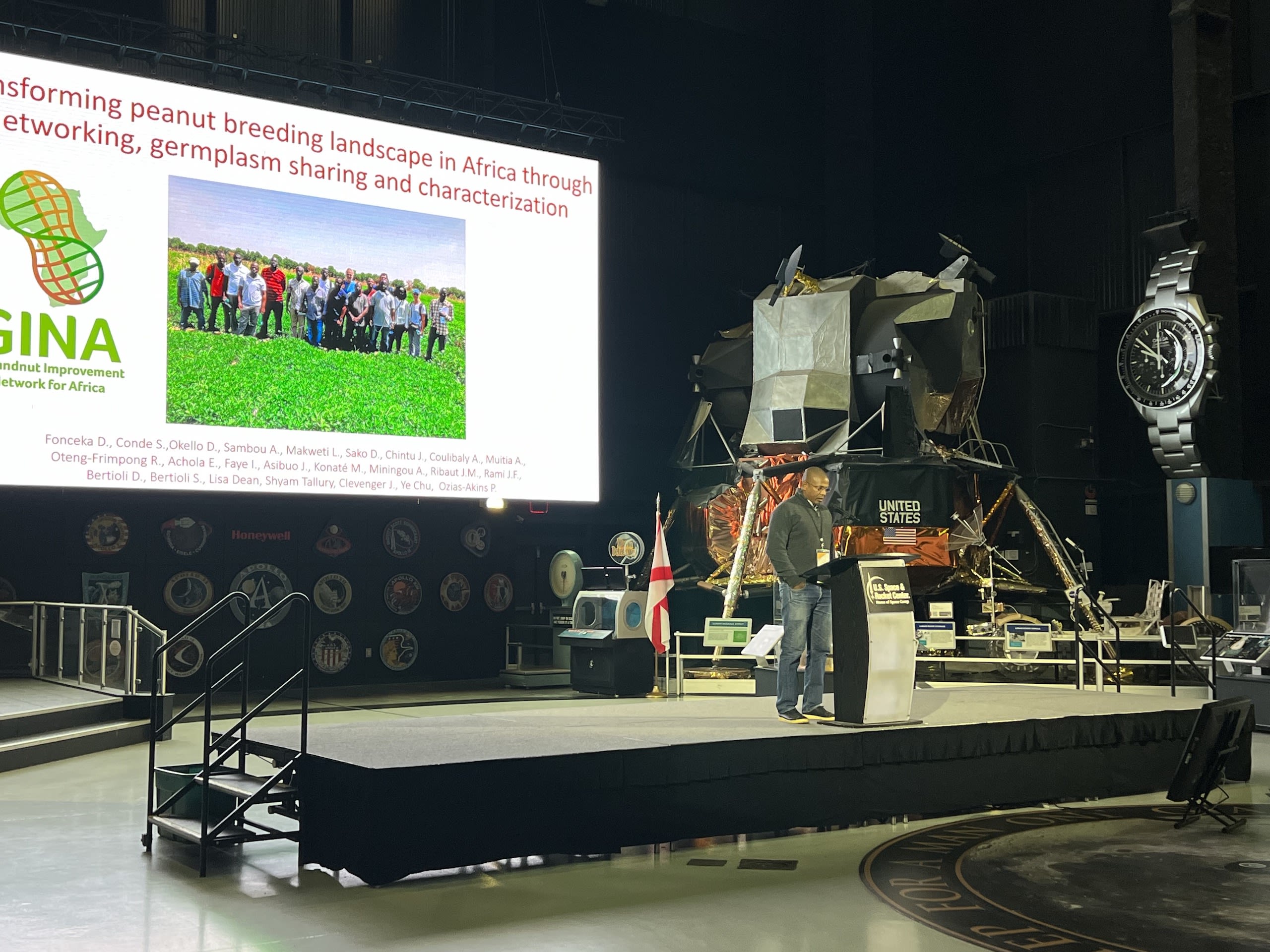 A man giving a scientific presentation at the US Space and Rocket Center