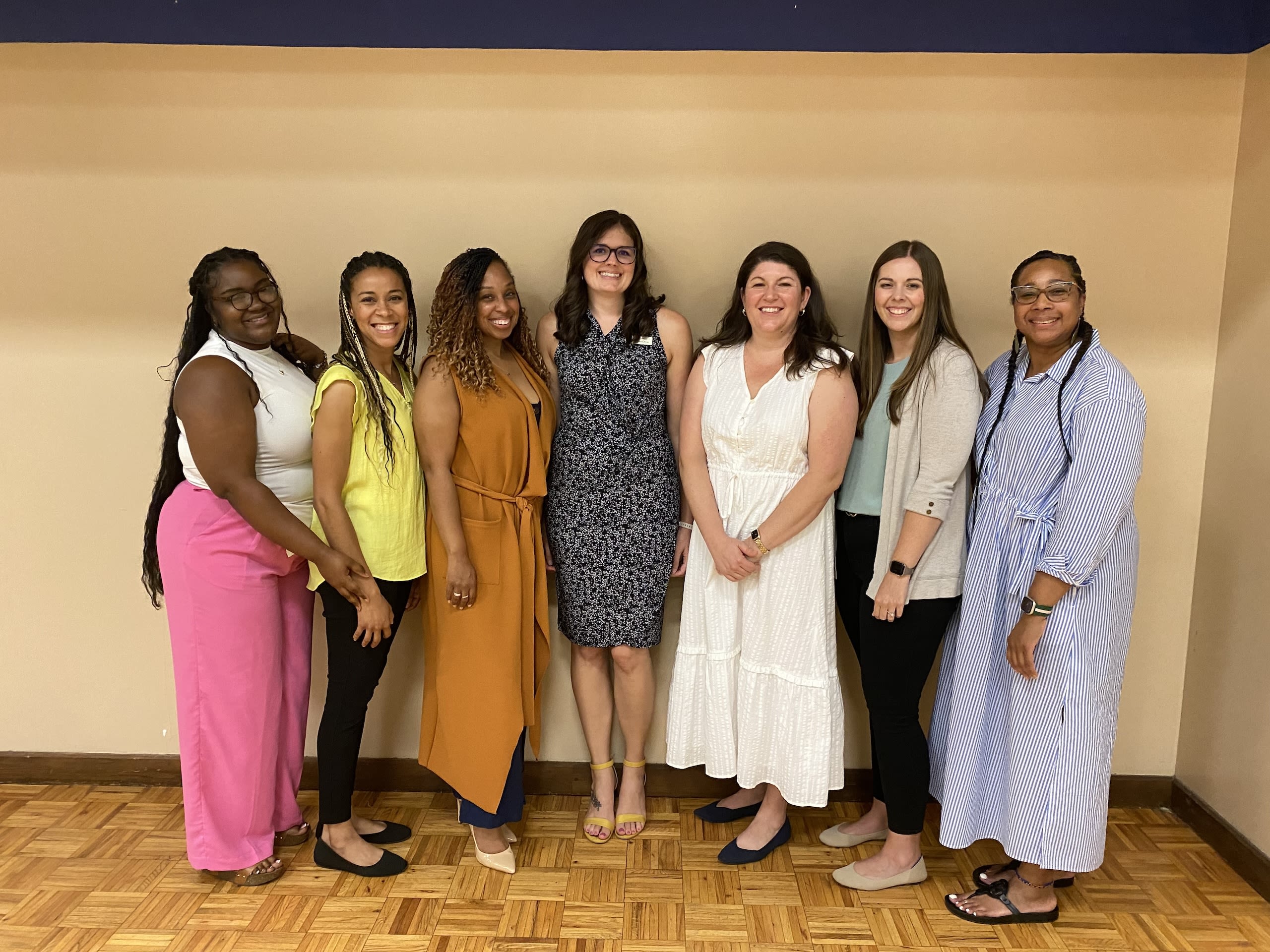 A group of women posing for a photo 