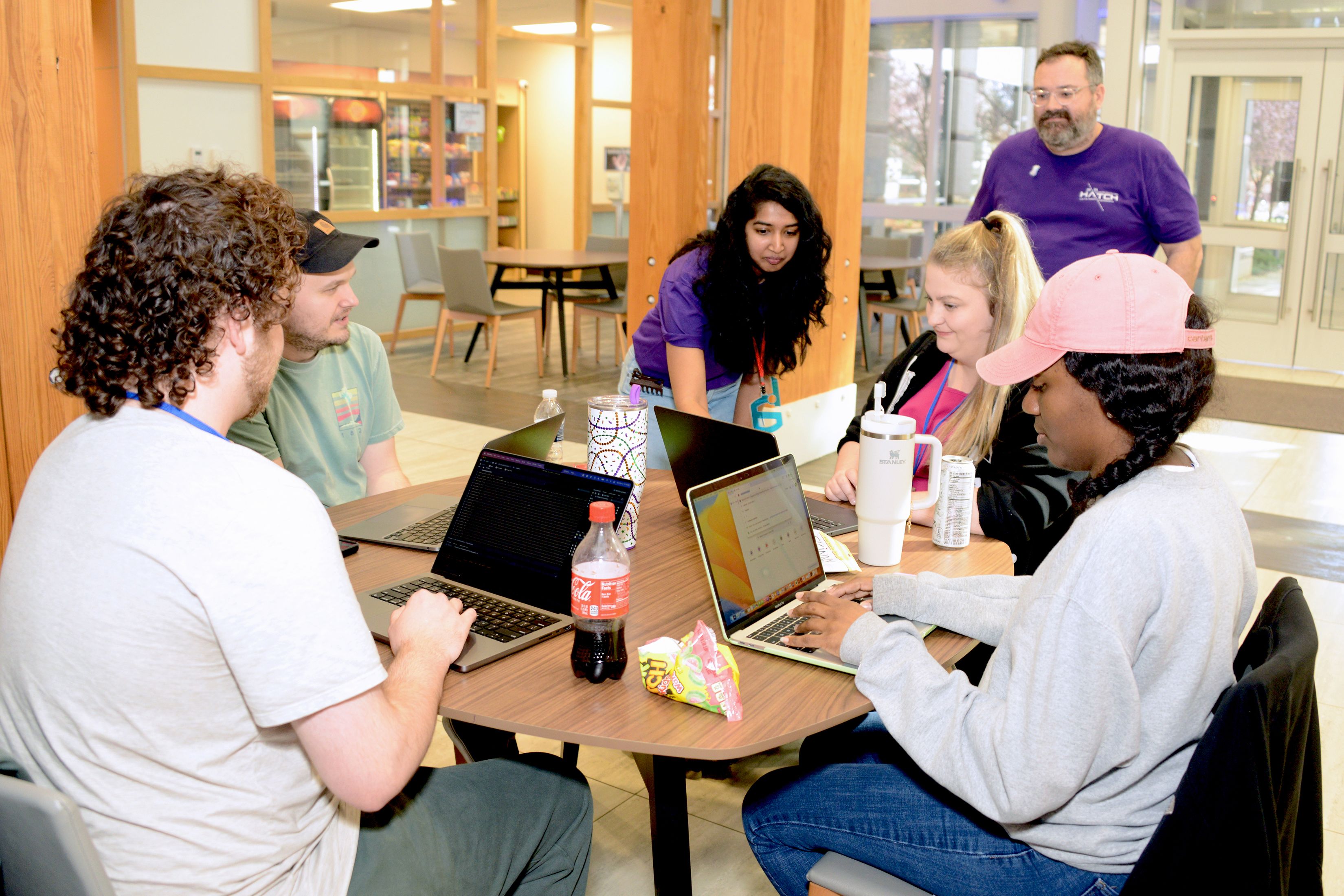A group of college students working on a project