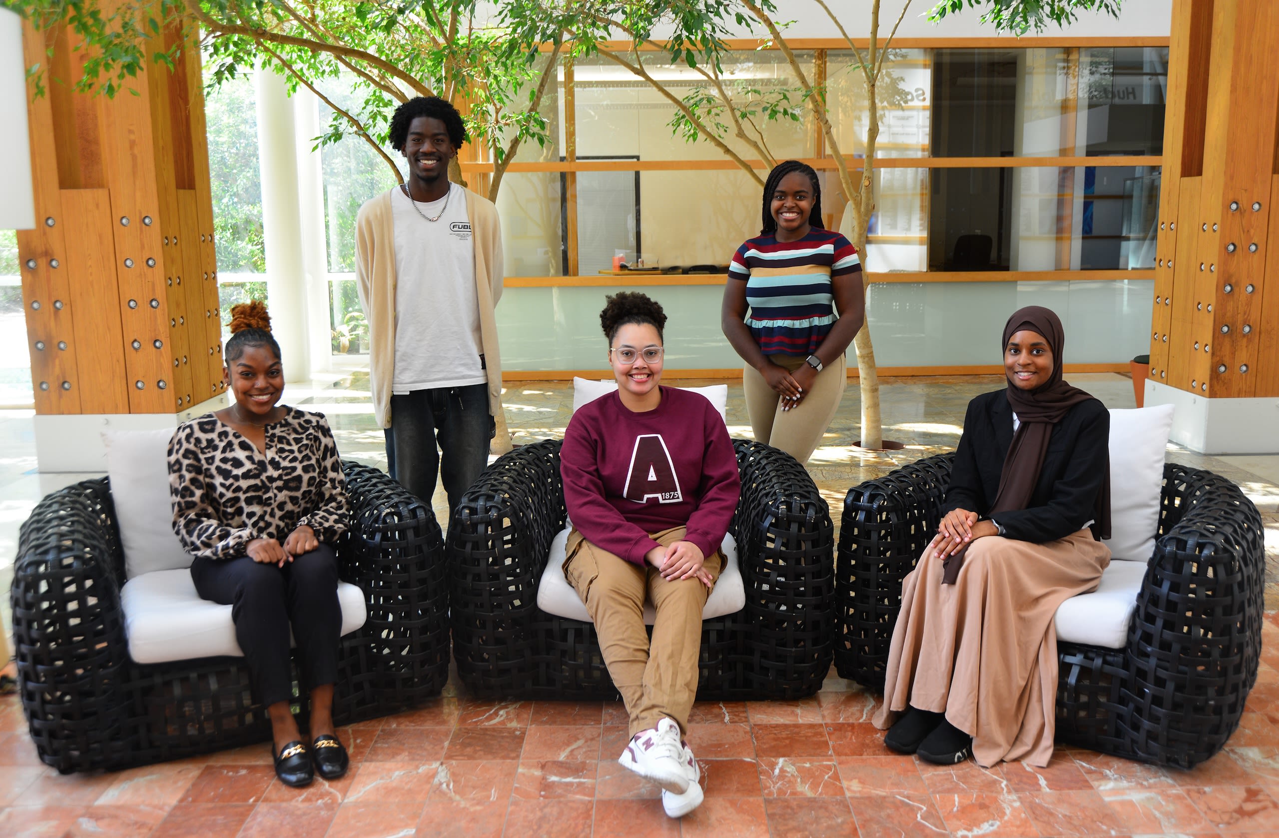 A group of young people posing for a photo 